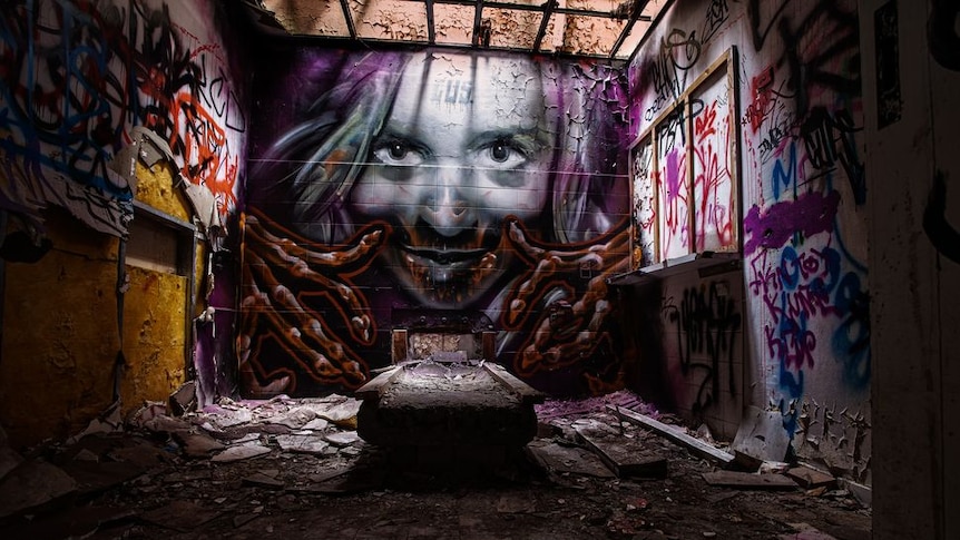 Graffiti riddled walls of the abandoned Larundel Asylum