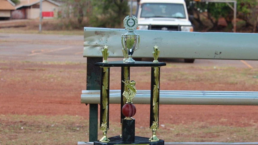 An impressive trophy sitting on a park bench in Yirrkala.