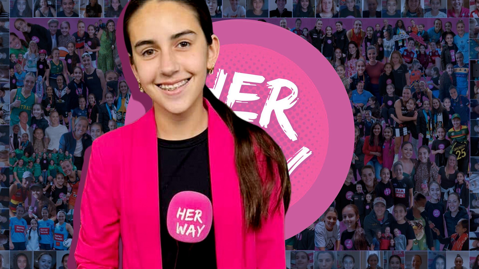 Abbie smiles to camera. In the background hundreds of photos of her with sportwomen she's interviewed.