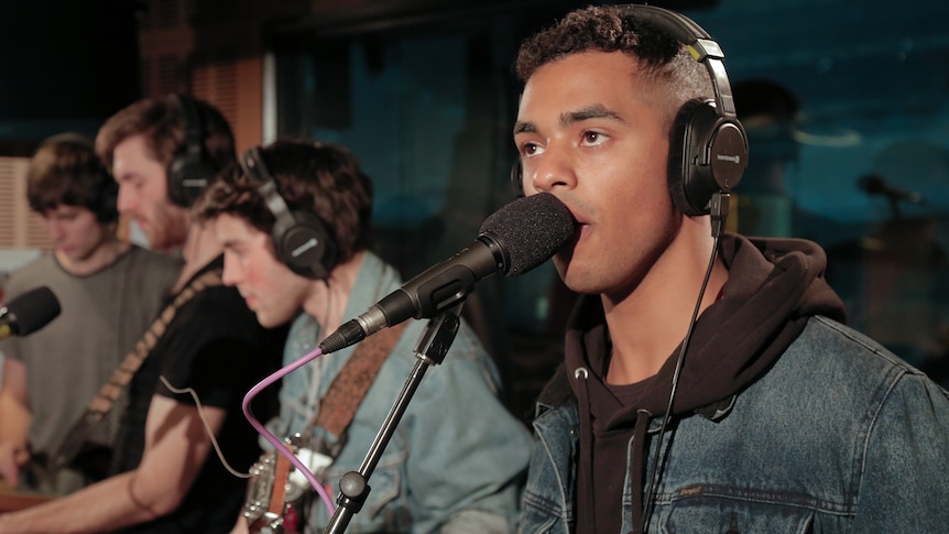 A photo of Northeast Party House doing a live performance of 'Covered In Chrome' in the triple j studios