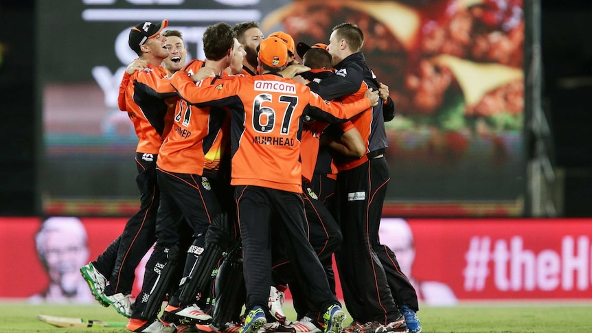 Winning feeling ... The Scorchers celebrate their victory over the Sixers