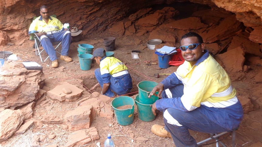 Eastern Guruma traditional owners on site at the Pilbara rock shelter