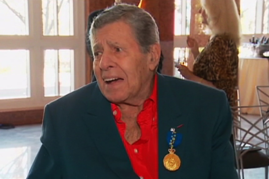 Actor Jerry Lewis wearing his medal recognising him as an honorary member of the Order of Australia for his services to charity.