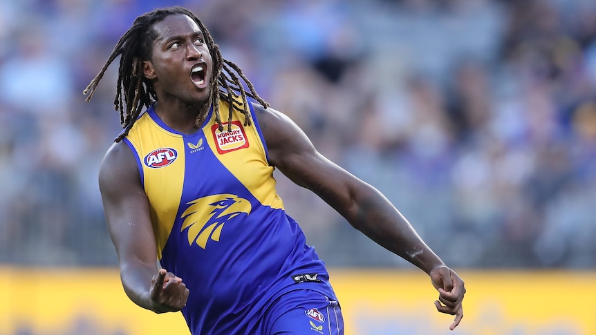 West Coast Eagles AFL player Nic Naitanui shouts as he runs after kicking a goal against Fremantle Dockers.