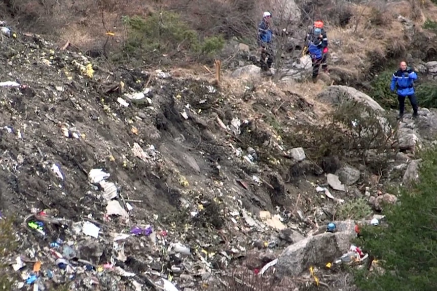 Search and rescue personnel at the crash site of a Germanwings aircraft.
