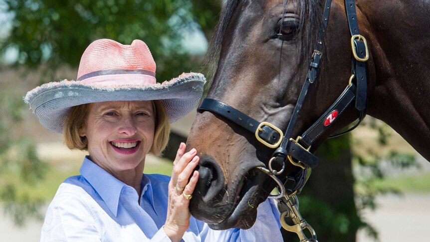 Gai Waterhouse poses with Melbourne Cup favourite Fiorente