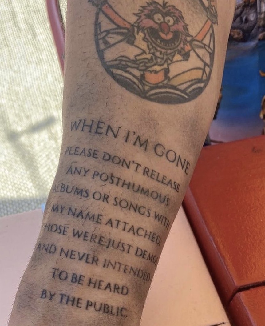 Anderson .Paak's tatooed arm reading: When I'm Gone Please Don't Release Any Posthumous Albums or Songs With My Name Attached