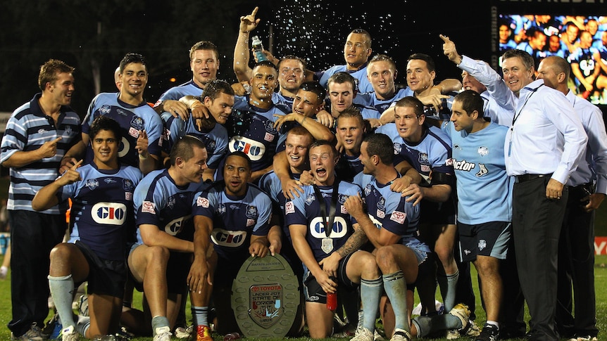 Outshining the senior side ... the Baby Blues celebrate victory