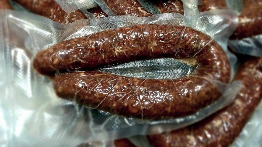 Italian dried sausage in plastic packaging