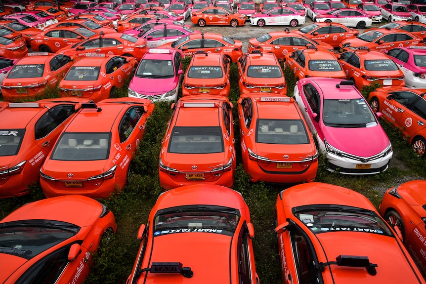 A field of abandoned taxis as coronavirus spreads in Bangkok