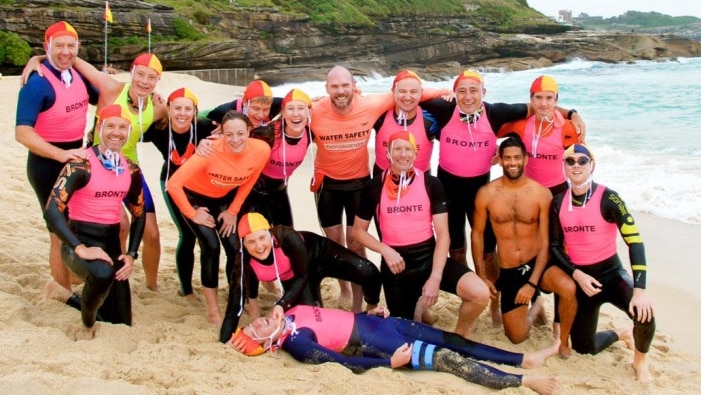 NY Times Australian Bureau Chief Damien Cave (far left) on Bronte Beach in Sydney with his Surf Lifesaving crew