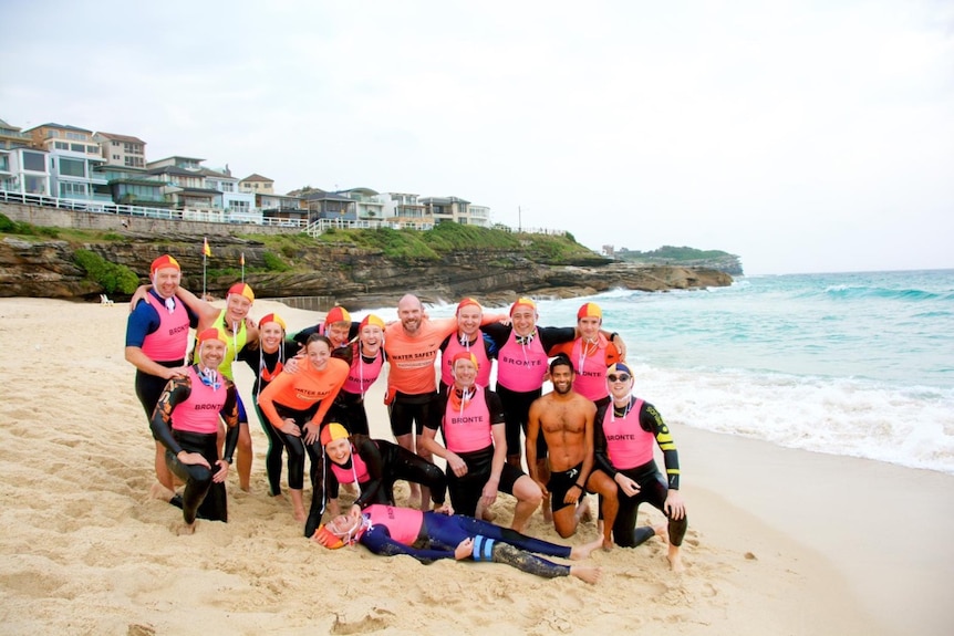 Group of lifesavers on the beach 