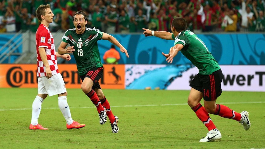 Mexico's Andres Guardado celebrates scoring his team's second against Croatia.