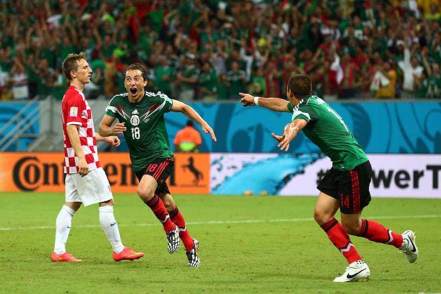 Mexico's Andres Guardado celebrates scoring his team's second against Croatia.