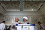 Iranian cleric casts his vote