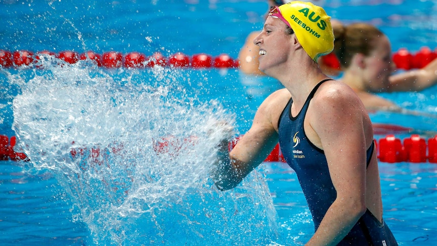 Australia's Emily Seebohm celebrates after winning the 200m backstroke at the world swim titles