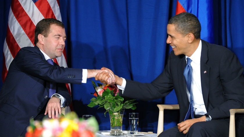 Barack Obama and Dmitry Medvedev shake hands
