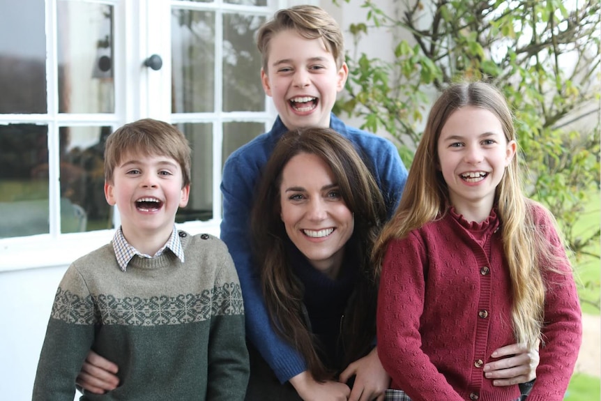 The Princess of Wales pictured with her children Louis, George and Charlotte in a photo some believe has been manipulated
