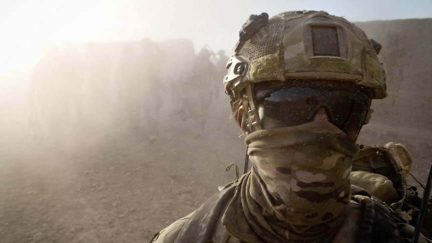 An Australian special forces soldier wearing goggles and a face covering in Afghanistan.
