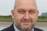 A 2015 profile picture of Welsh politician Carl Sargeant.