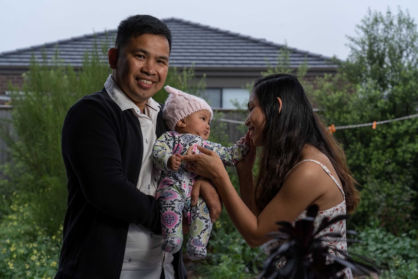 Handyman Joey Gicoso and his wife and baby at their home in Manor Lakes, Victoria.