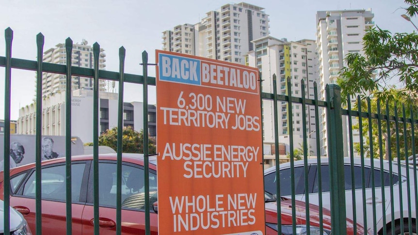 A Back Beetaloo poster on a fence.