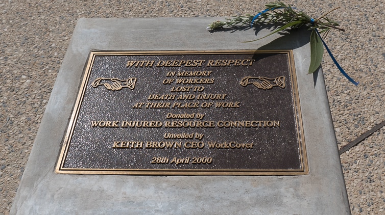 Centre plaque at Deceased Workers Memorial.