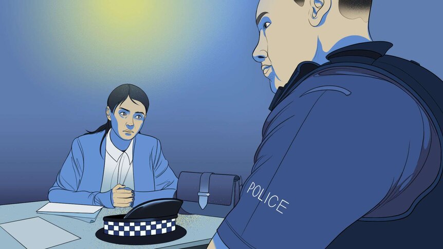 An illustration shows a woman sitting across a desk from a police officer