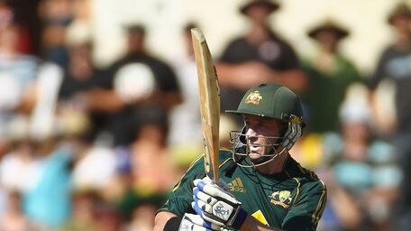 Injecting some life: Hussey smashed five fours and a six on his way to a quickfire 49.