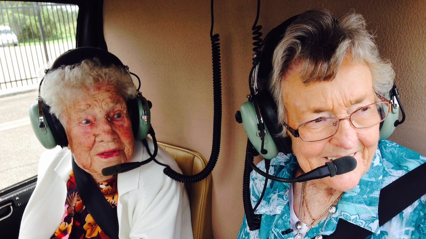 Marcia Bannister and Patricia Allison get ready for takeoff