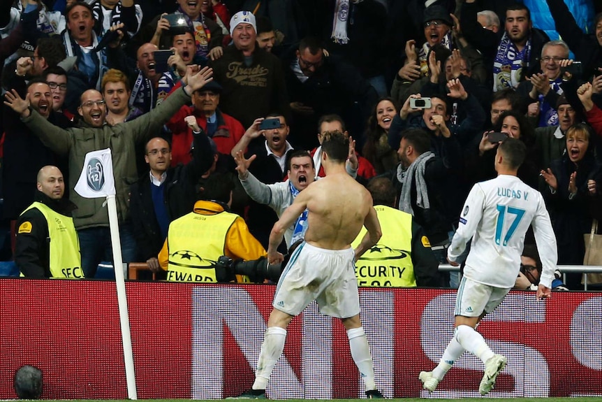 Cristiano Ronaldo with his shirt off celebrating his goal against Juventus in the Champions League