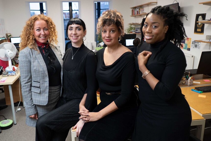 Four candidates from the Women's Equality Party pose at the party headquarters in London.