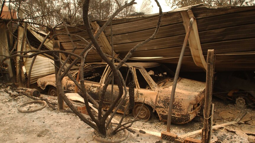 Car and garage damaged by fire in Duffy.