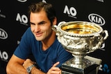 Switzerland's Roger Federer meets the press after winning the Australian Open men's singles title.