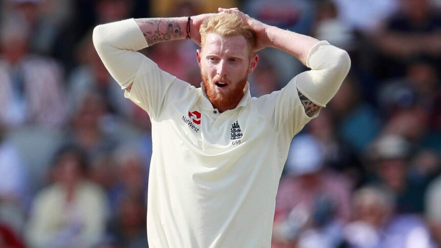 Ben Stokes with his hands behind his head playing for England in a Test against South Africa.