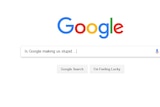 A snip of the Google search engine main search screen with 'is Google making us stupid' in the search field.