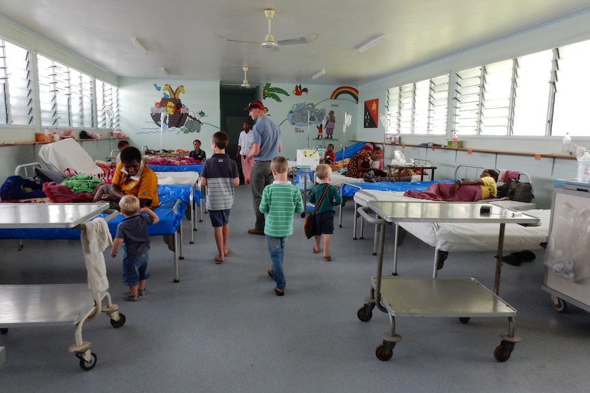 Children visit other children in a paediatric ward in PNG