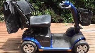 A blue mobility scooter.