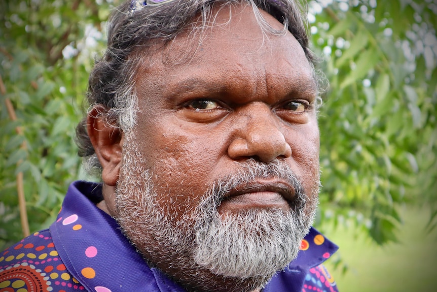 Close up of middle aged Indigenous man with beard