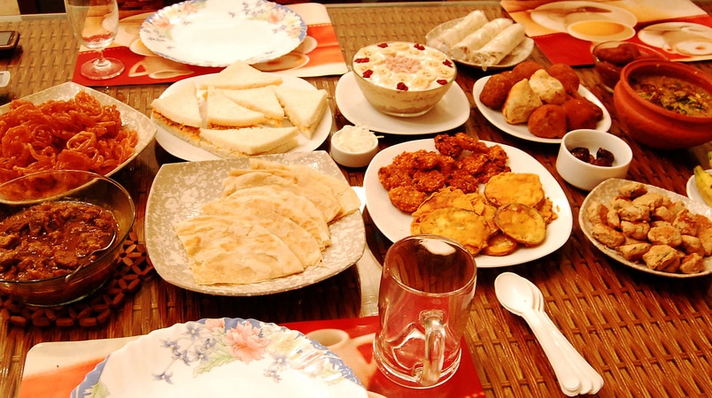 Iftar feast spread out on a table.
