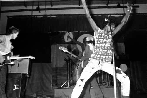 Black and white photo of the Warumpi band live on stage