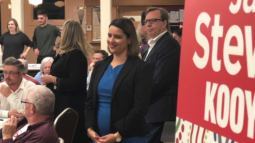 Jana Stewart, Labor candidate for Kooyong, standing in a crowd at a campaign function