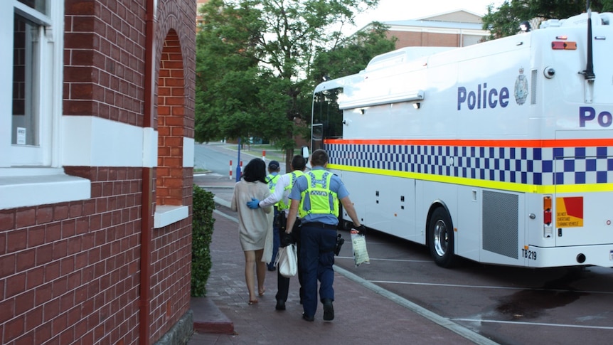 Police arrest a woman