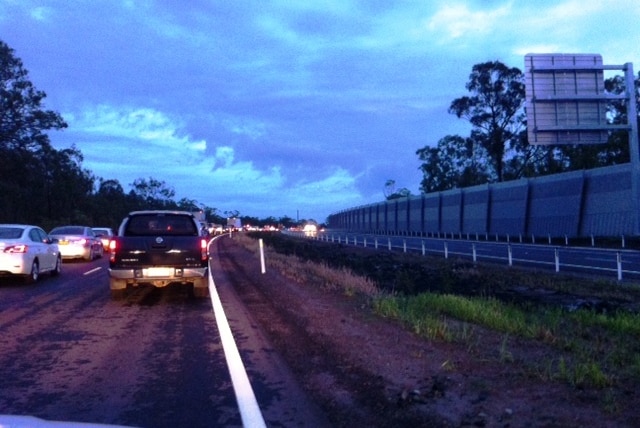 Traffic queued in the first weekday morning peak on the new Hunter Expressway.