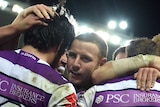 Melbourne Storm celebrate Mann try against Roosters