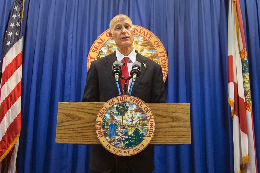 Florida Governor Rick Scott lays out his school safety proposal during a press conference.