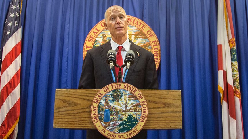 Florida Governor Rick Scott lays out his school safety proposal during a press conference.