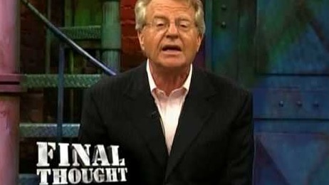 Jerry Springer speaks to the camera on set of his show.