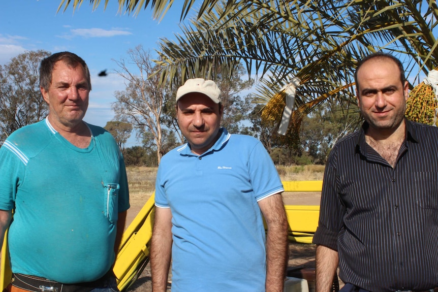 The University of Sydney researchers and farmer Steve Brauer.