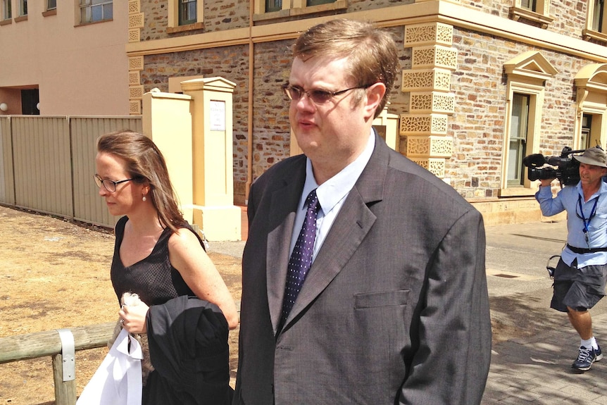 With his lawyer, Bernard Finnigan left the court
